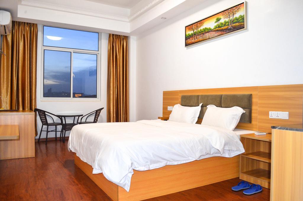 Chinese Business Hotel Kampala Bagian luar foto