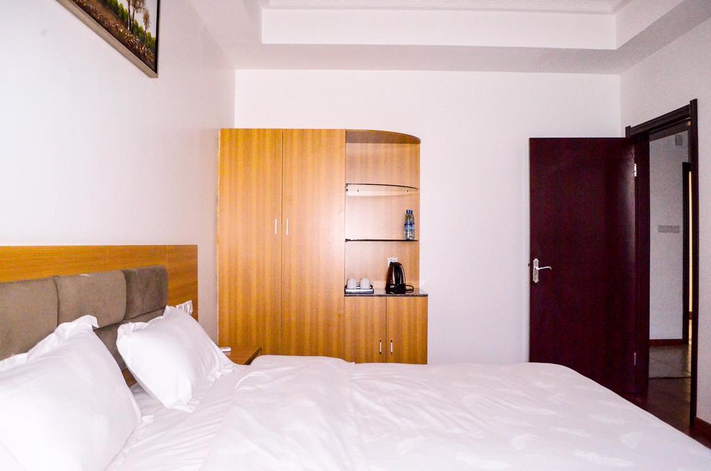 Chinese Business Hotel Kampala Bagian luar foto