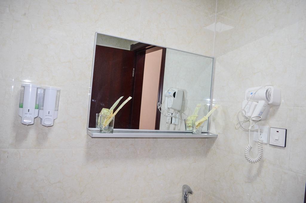 Chinese Business Hotel Kampala Bagian luar foto