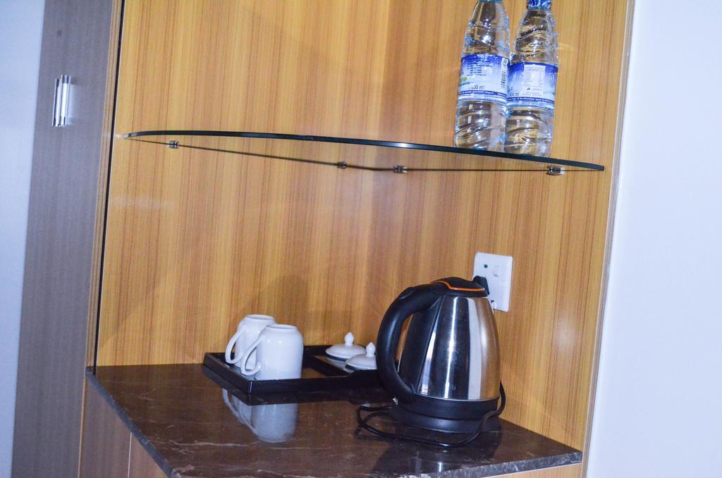 Chinese Business Hotel Kampala Bagian luar foto