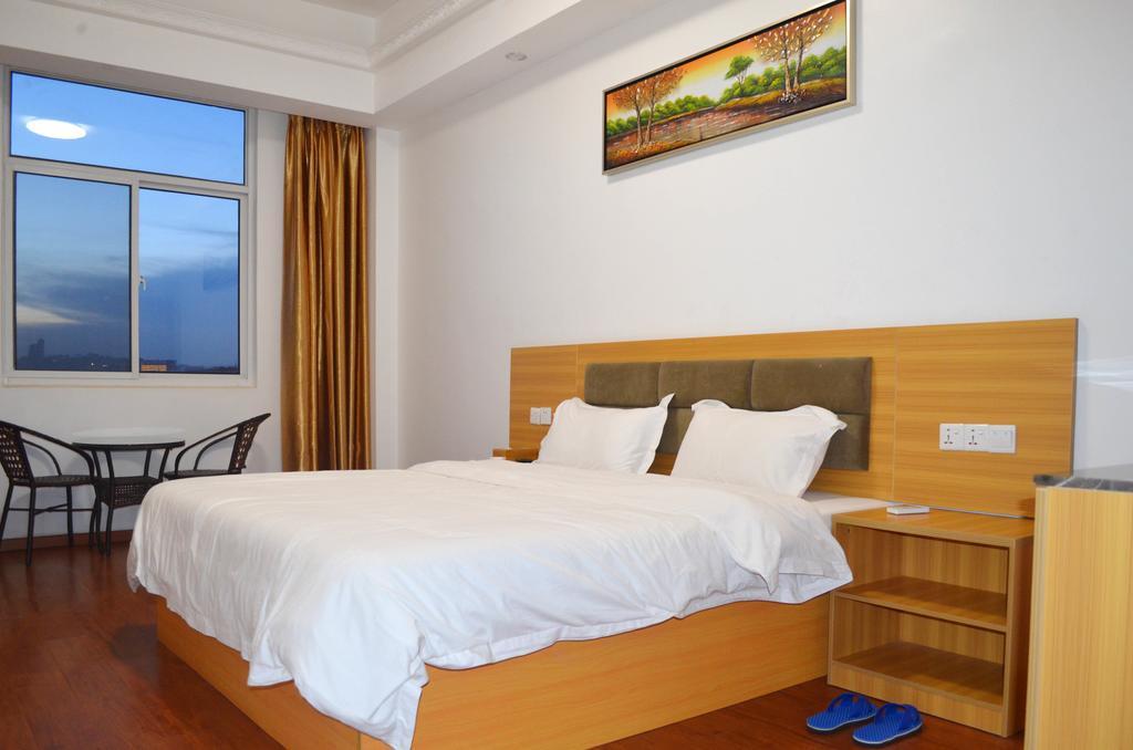 Chinese Business Hotel Kampala Bagian luar foto